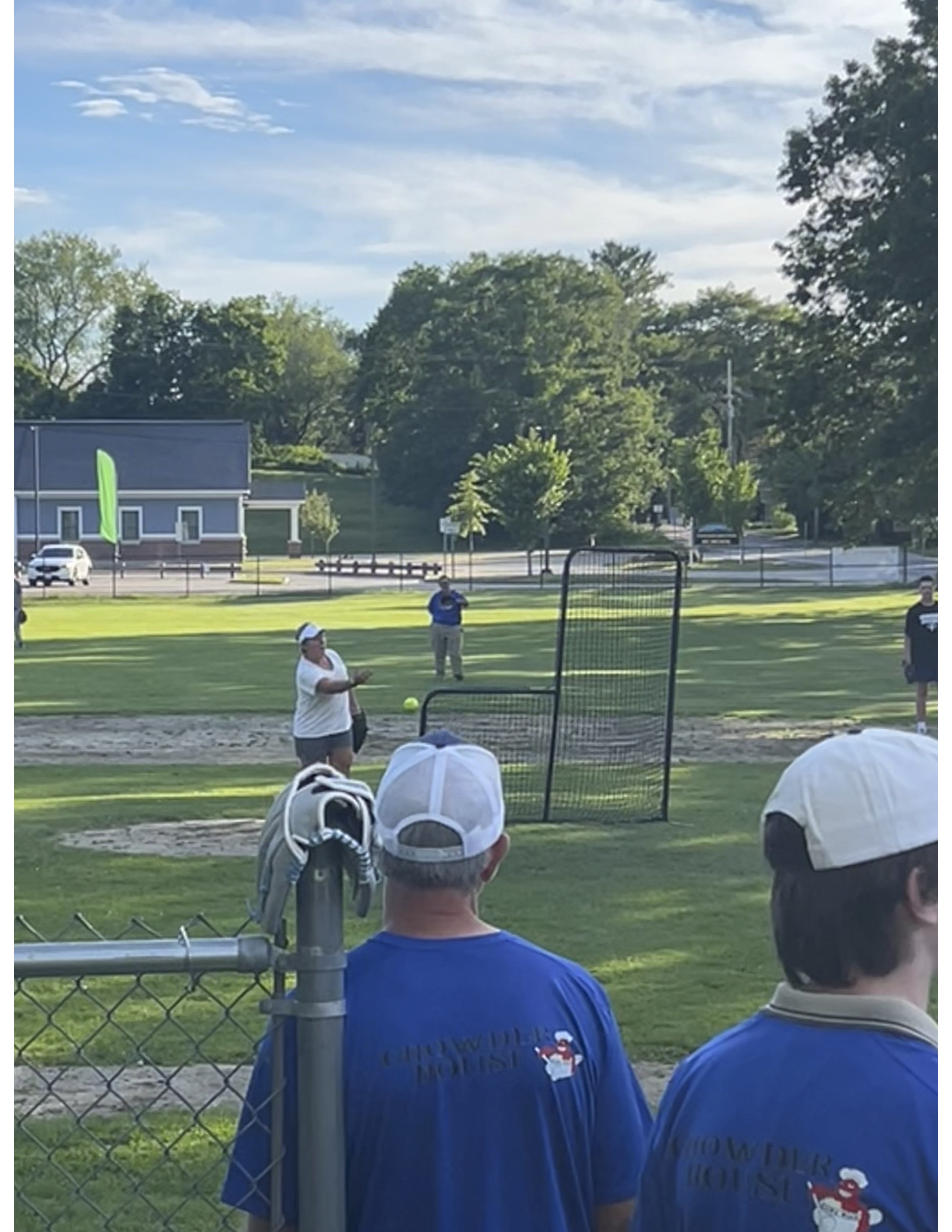 At all-ages community softball game, fun is the biggest hit